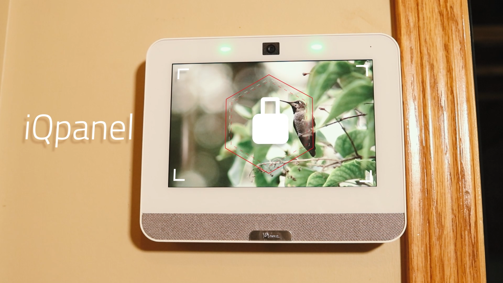 A close-up of the IQ4 smart home security control panel from Alarm.com. It is called the iQpanel.